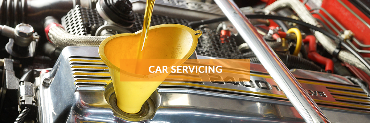 Engine oil being poured during a service